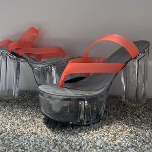 Clear bottom chunky platform thing style heels. They wrap around the ankle once.